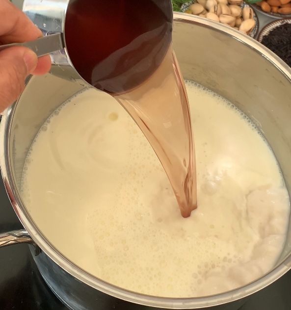 Step 1.1: In a heavy-bottomed pot mix a cup of reserved rice water and the milk
