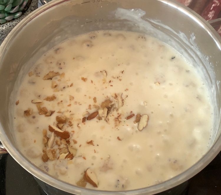 Step 1.1: Add the chopped nuts and cook for an additional 2-3 minutes, then turn off the heat