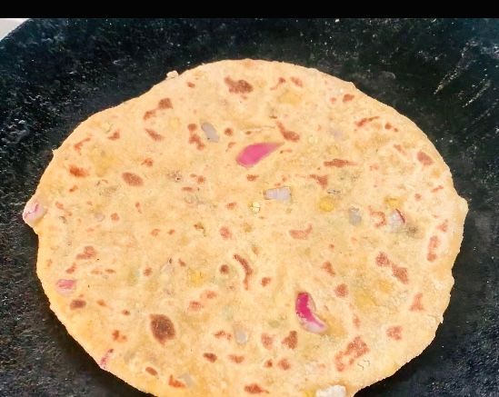 Step 1.1: Cook the paratha for 1-2 minutes on one side