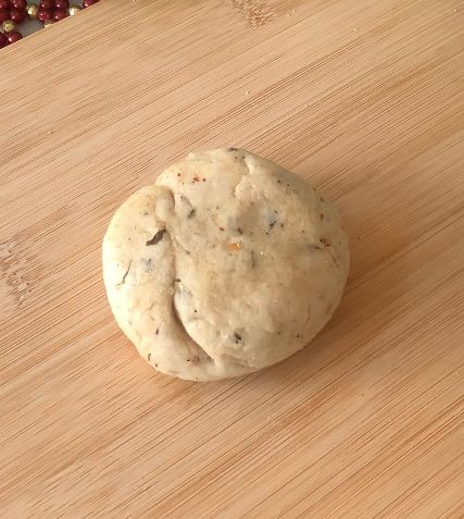 Step 1.1: Divide the dough into 4 parts and roll them into balls