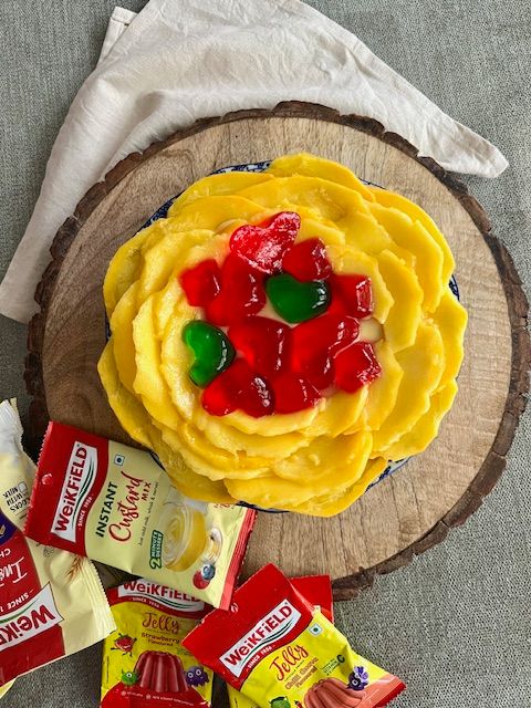 Step 1.1: Slice the mango or whichever fruit you are using and decorate the cake with it