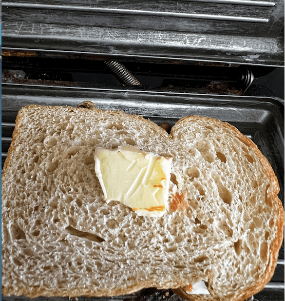 Step 1.1: Sprinkle pizza seasoning and Grill with butter on both the sides