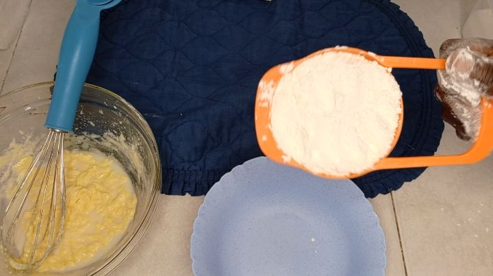 Step 1.2: In a separate bowl add in 1 cup of all purpose flour and 1 tbsp of baking powder