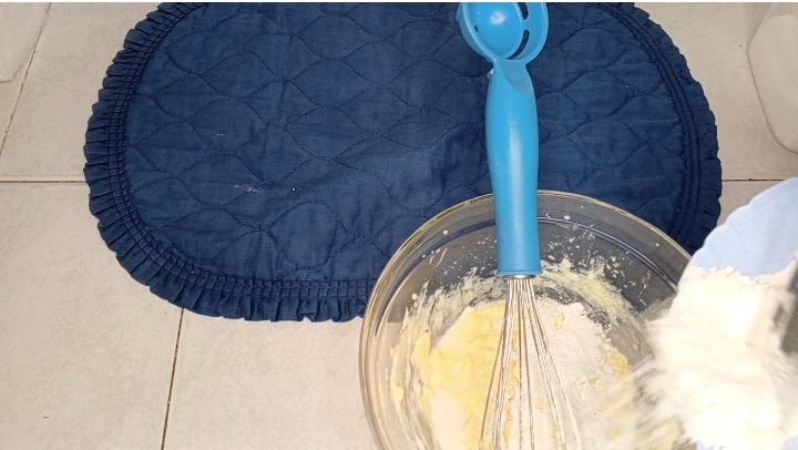 Step 1.1: Once mixed ,add in the flour bit by bit to your butter and mix well