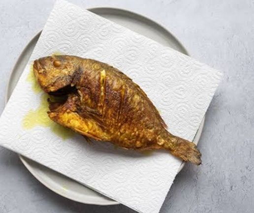 Step 1.1: Drain the fried fish on paper towels to remove excess oil