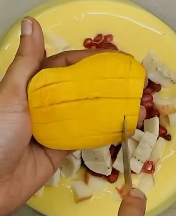 Step 1.3: While the custard is cooling, chop the mixed fruits into bite-sized pieces