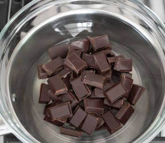Step 1.1: Break the chocolate into small pieces and melt it