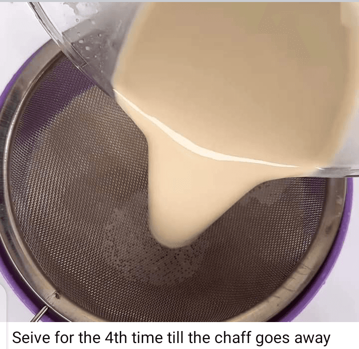 Step 2.1: Strain the mixture through a cheesecloth or a fine mesh sieve into a large bowl or container
