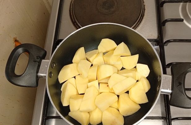 Step 1.1: Place your potatoes in a cooking pot and add 1 cup of clean water