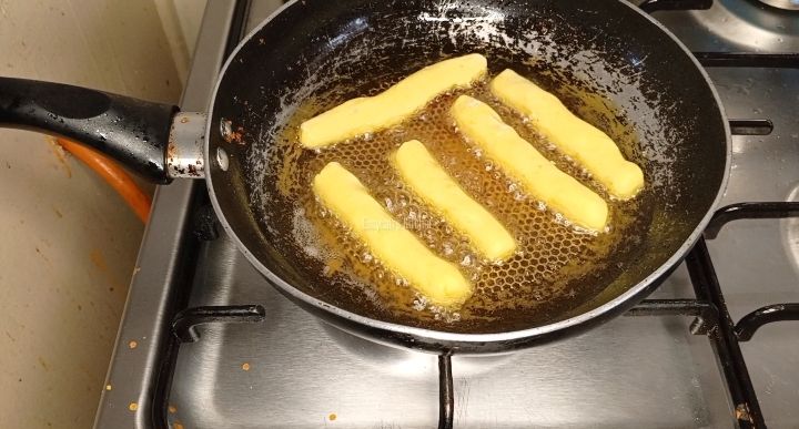 Step 1.5: In a medium heat pan ,add in Oil and fry the potatoes till golden brown color