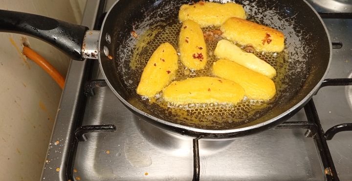 Step 1.4: In a medium heat pan ,add in Oil and fry the potatoes till golden brown color