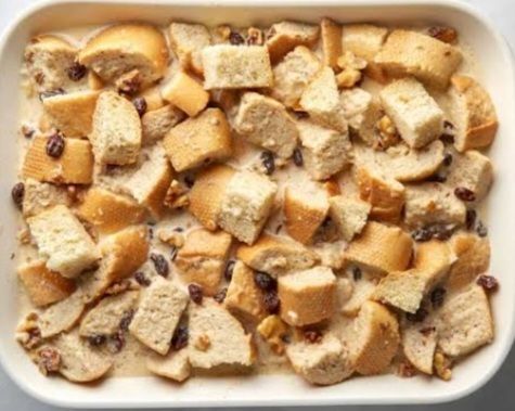 Step 1.1: Place the cubed bread into the prepared baking dish