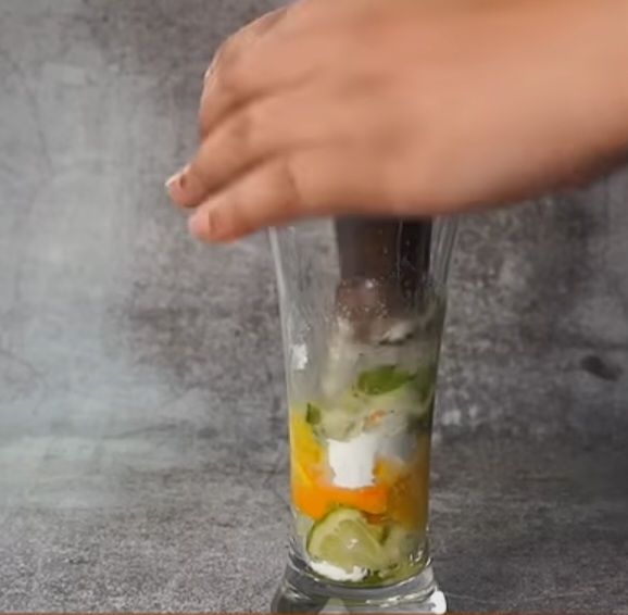 Step 1.4: Add pinch of black salt and 5 to 6 mint leaves and muddle
