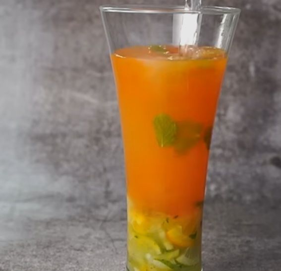 Step 1.1: Add more mint leaves and pour 1/4 cup of orange juice
