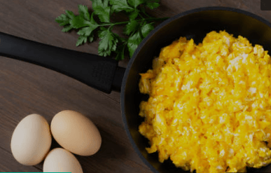 Step 1.1: Add the cooked rice, corn, and beaten egg and mix thoroughly