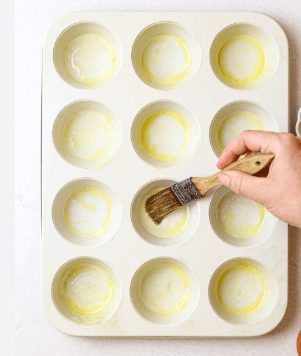 Step 1.1: Divide the egg mixture evenly among the prepared muffin cups, filling each about 3/4 full