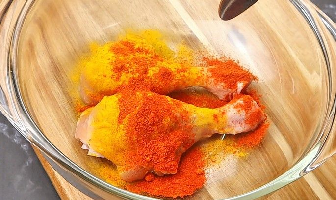 Step 1.3: In a mixing bowl, add the chicken drumsticks