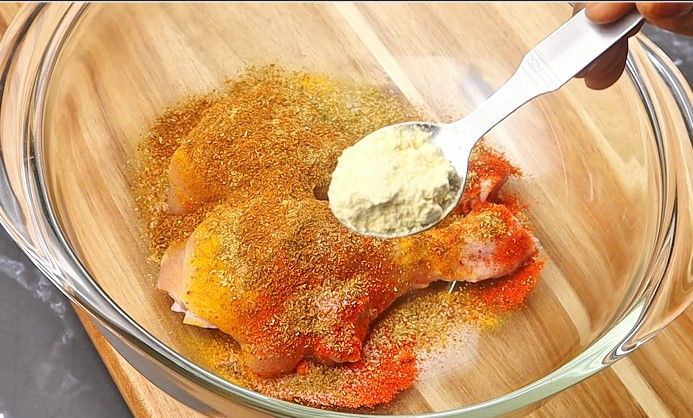 Step 1.8: In a mixing bowl, add the chicken drumsticks
