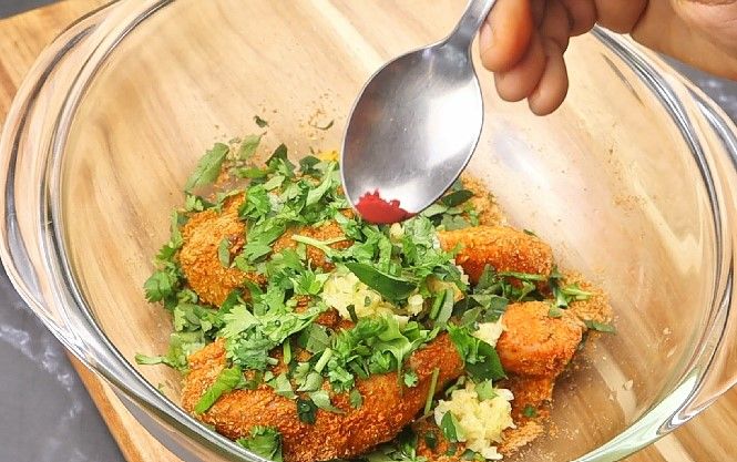 Step 1.5: Add ginger garlic paste, curry leaves, coriander leaves, lemon juice, and red food color (if using)