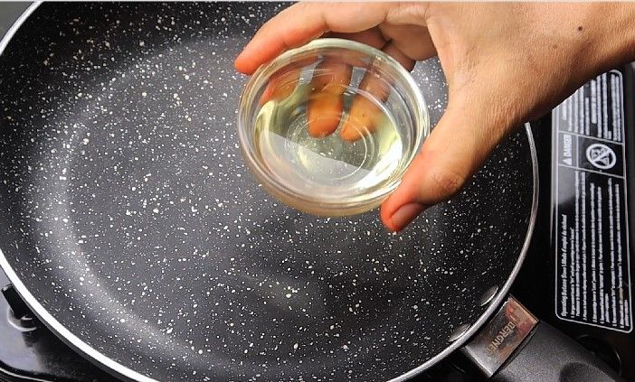 Step 1.1: Heat a pan on medium flame and add oil