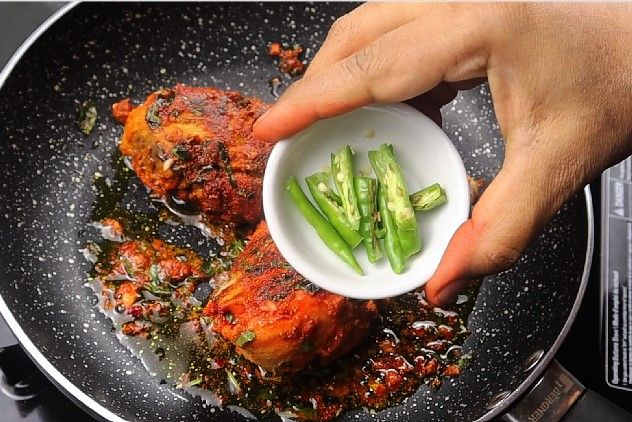Step 1.1: Open the lid, add slit green chillies, and cover again