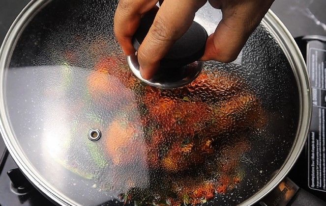 Step 1.3: Open the lid, add slit green chillies, and cover again