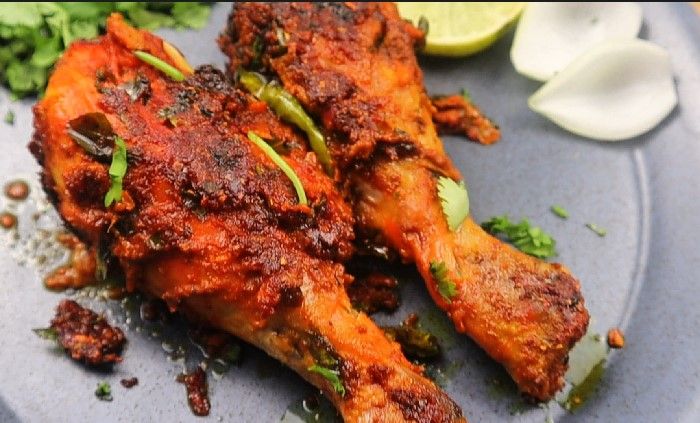 Step 1.3: Squeeze some lemon juice over the chicken and serve hot with lemon wedges, onions, and your favorite drink