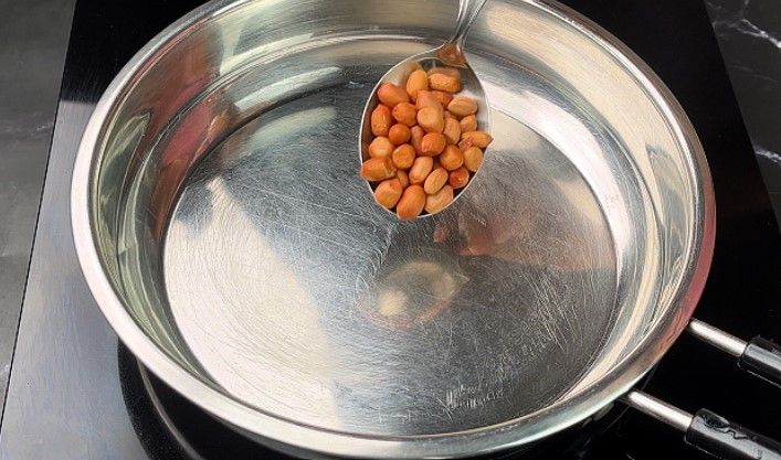 Step 1.2: Roast the peanuts until the skin separates