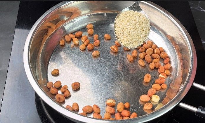Step 1.1: Roast the sesame and dry coconut on low flame until golden