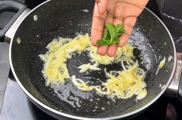 Step 1.1: Add the sliced tomato, Coriander leaves, and chopped mint