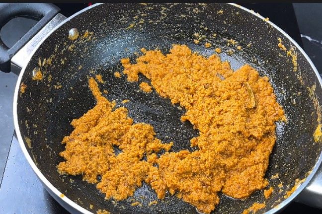 Step 2.3: Sauté until the oil separates from the masala paste