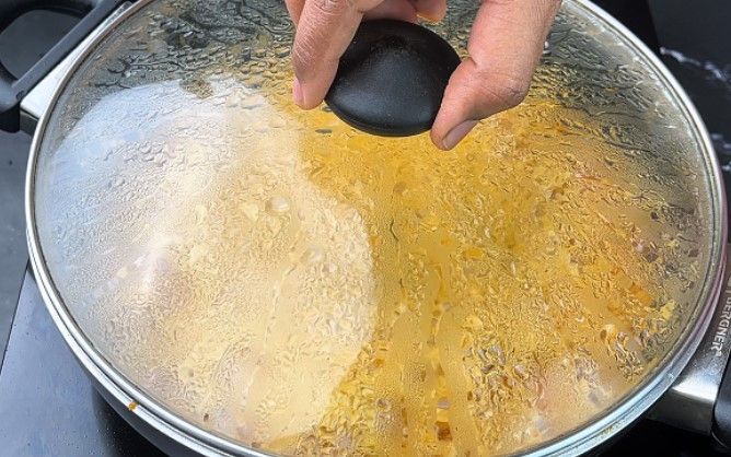 Step 2.2: Cover and boil for 10 minutes or until oil starts to float