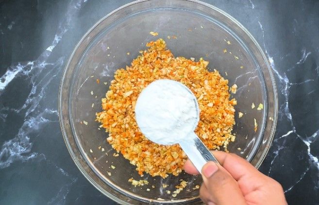 Step 1.1: Add maida (all-purpose flour) and corn flour to the mixture