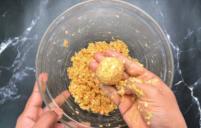 Step 1.2: Lightly grease your palms with oil and shape the mixture into small, uniform balls