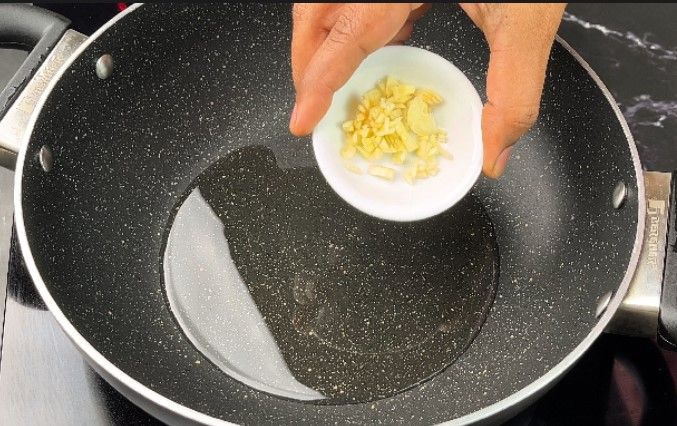 Step 2.2: In a pan, heat a tablespoon of oil