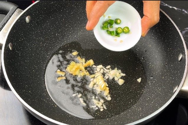 Step 2.4: In a pan, heat a tablespoon of oil