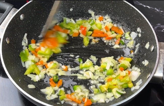 Step 2.5: Add finely chopped onion and capsicum