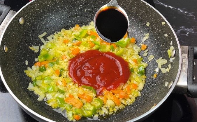 Step 2.2: Add tomato ketchup, vinegar, soy sauce, chili sauce, salt, and red chili powder