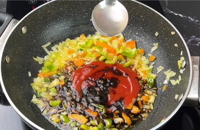 Step 2.3: Add tomato ketchup, vinegar, soy sauce, chili sauce, salt, and red chili powder