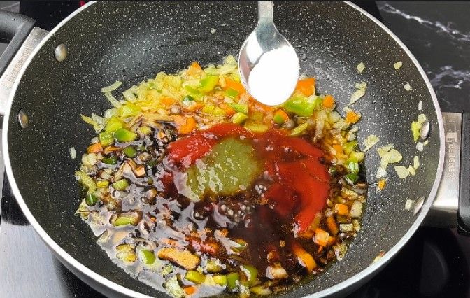 Step 2.5: Add tomato ketchup, vinegar, soy sauce, chili sauce, salt, and red chili powder