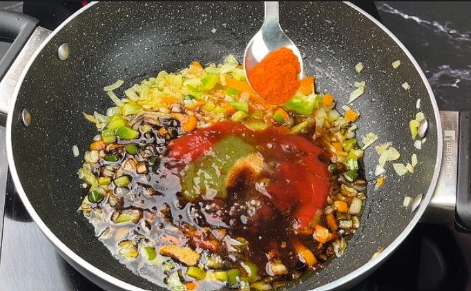 Step 2.6: Add tomato ketchup, vinegar, soy sauce, chili sauce, salt, and red chili powder