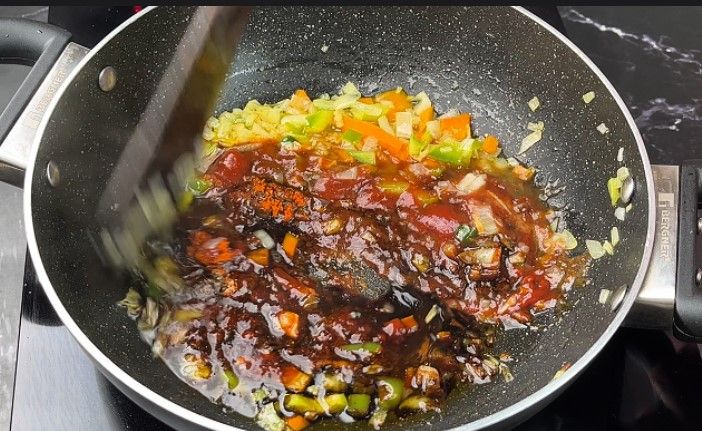 Step 2.8: Add tomato ketchup, vinegar, soy sauce, chili sauce, salt, and red chili powder