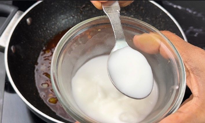 Step 2.3: In a small bowl, mix a teaspoon of corn flour with water to make a slurry