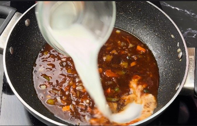 Step 2.4: In a small bowl, mix a teaspoon of corn flour with water to make a slurry