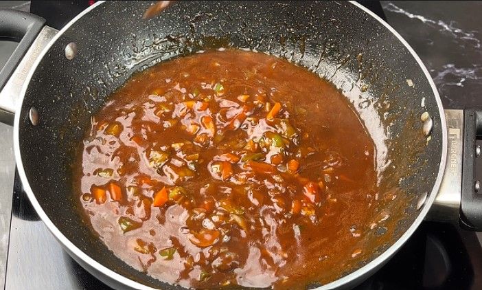 Step 2.1: Let the sauce simmer and thicken slightly