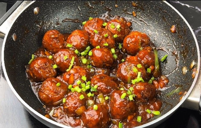 Step 2.4: Add the fried manchurian balls to the sauce