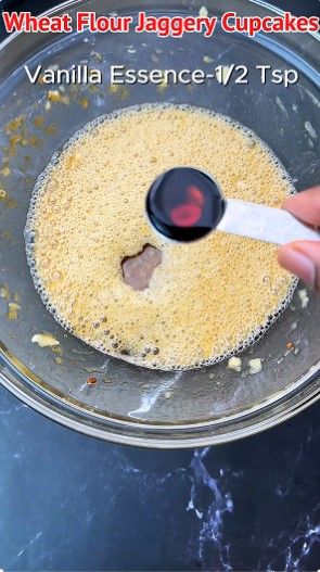 Step 1.2: Pour in vegetable oil and vanilla essence, then beat well until fully combined