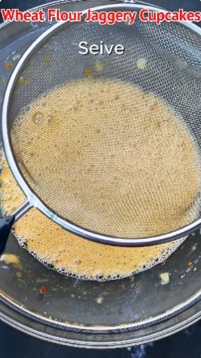 Step 1.1: Place a sieve on top of the bowl and add wheat flour, baking powder, baking soda, and cinnamon powder