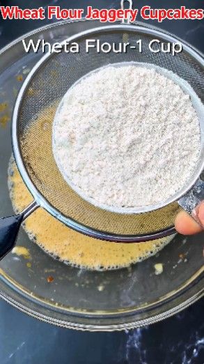 Step 1.2: Place a sieve on top of the bowl and add wheat flour, baking powder, baking soda, and cinnamon powder