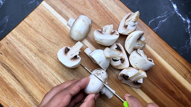 Step 1.1: Chop the mushrooms in half and set them aside